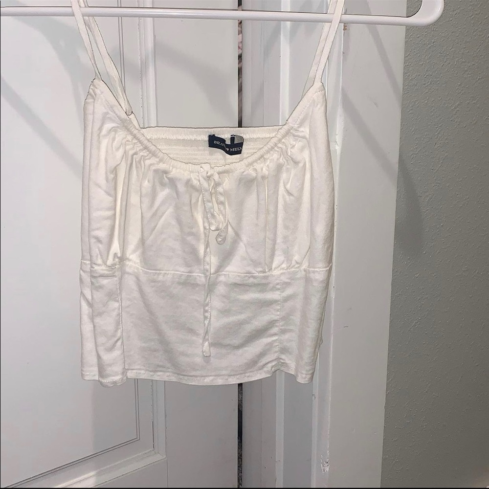 Brandy Melville, cream, didn’t say specific size.